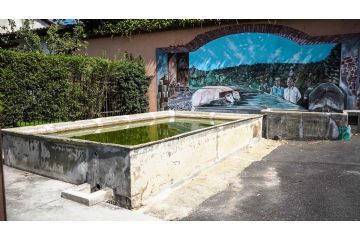 Abbeveratoio, antica fonte e murale di vita contadina in via Trionfo